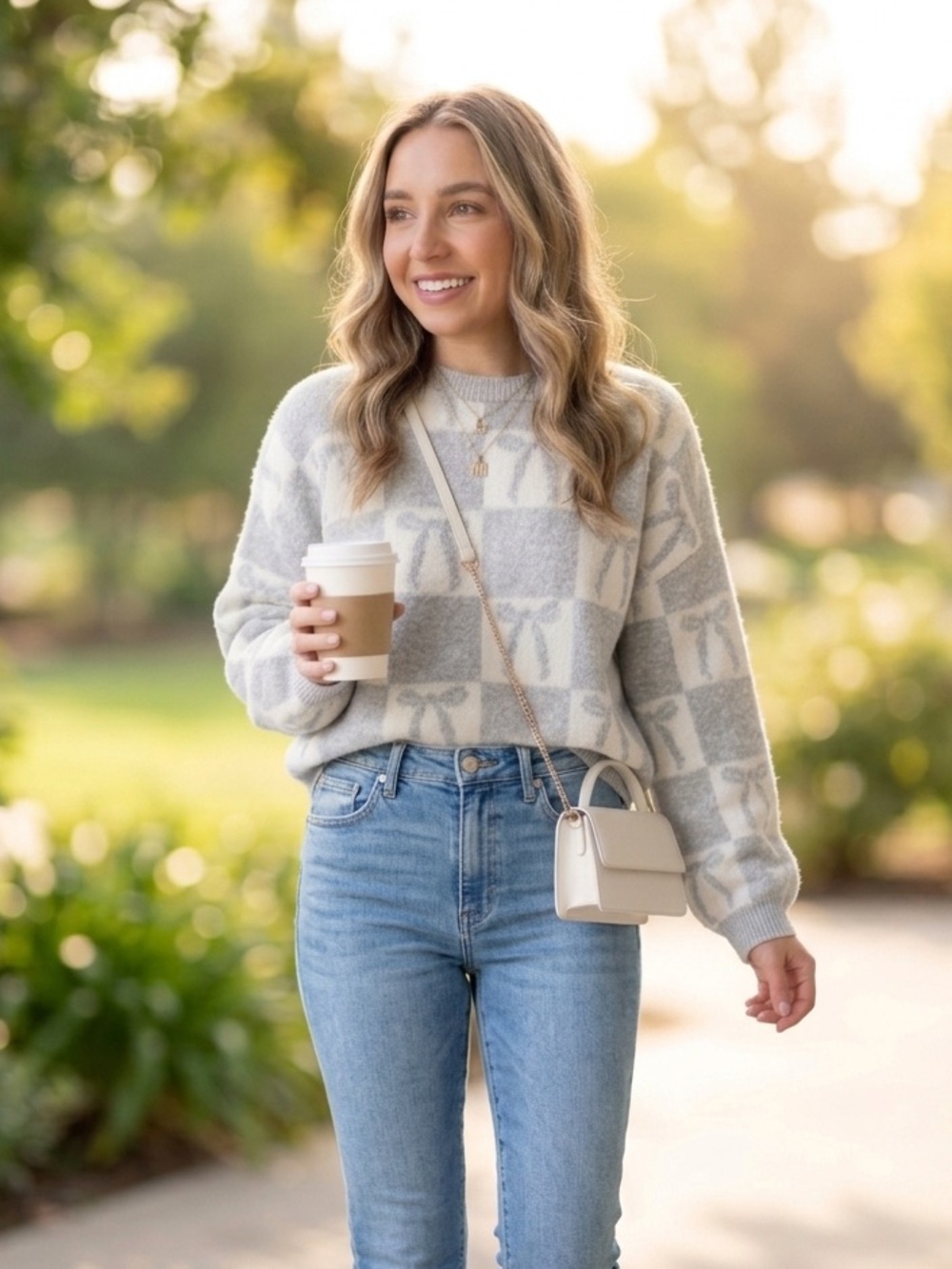 A New Day Gray and Cream Checkered and Bow-Pattern Sweater